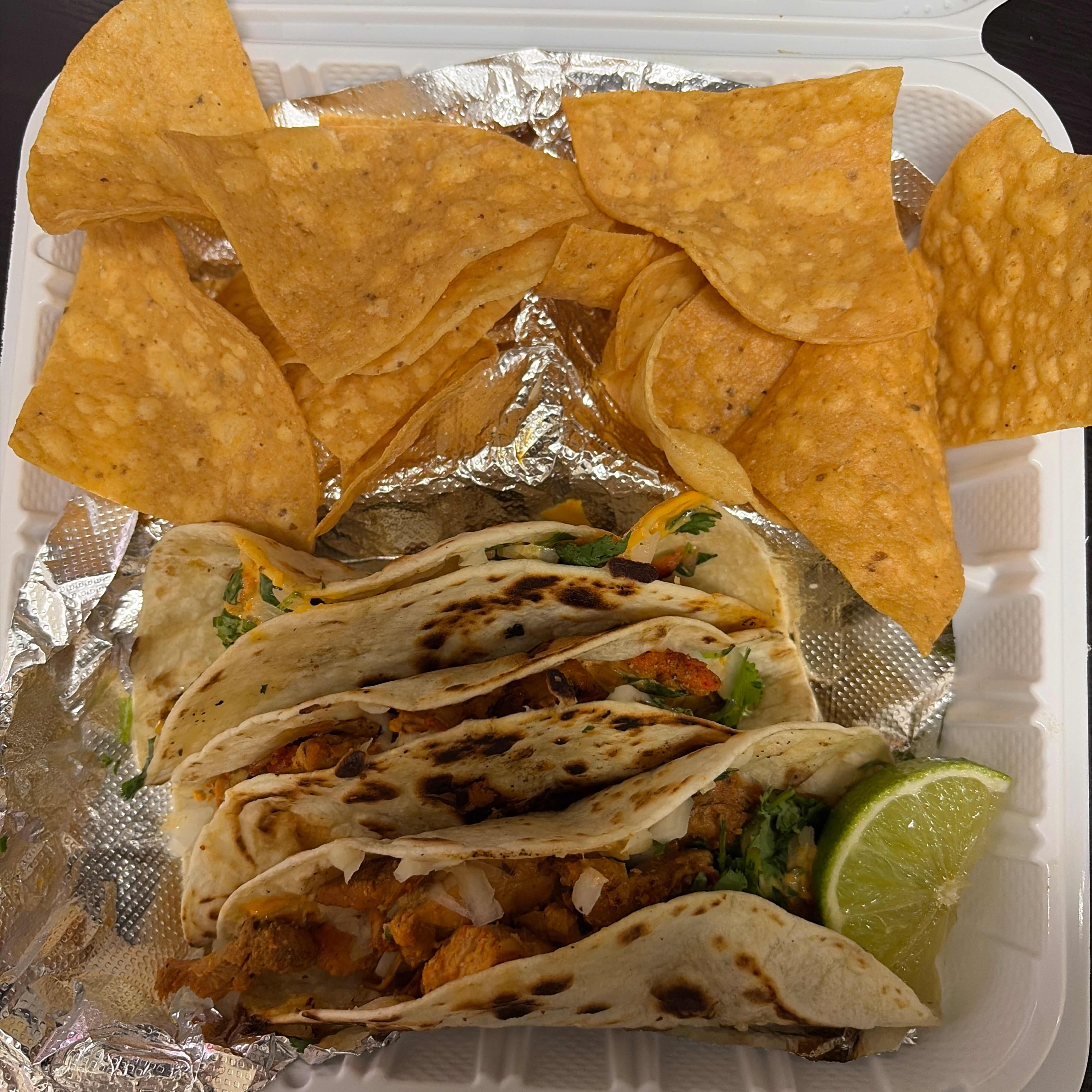 Boom Boom Chicken Tacos with tortilla chips and lime from Taco Time's Fulton menu
